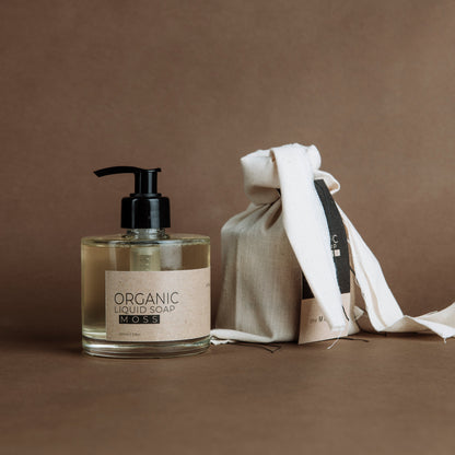 Moss organic liquid soap in glass bottle